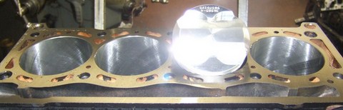 bloc avec pistons forges